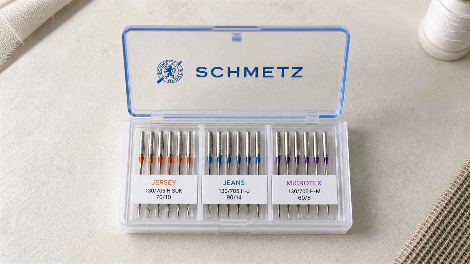 Étui d'aiguilles Schmetz ouvert avec différents types